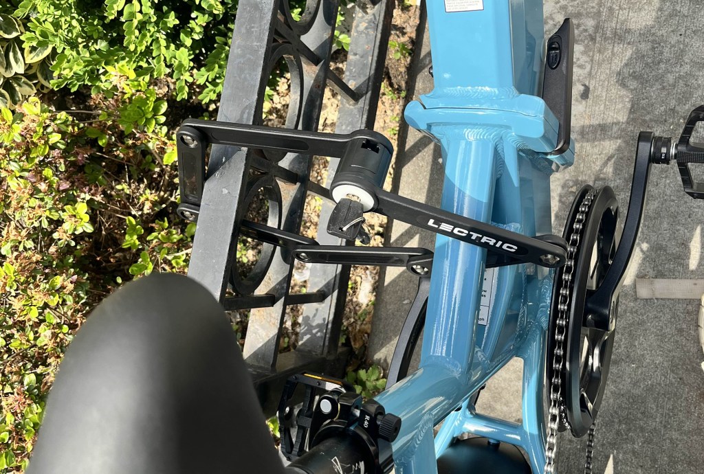 Lectric's XP4 750 e-bike locked to fence with bike lock