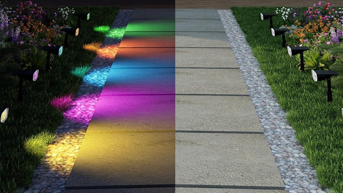 A multicolored light on a sidewalk
