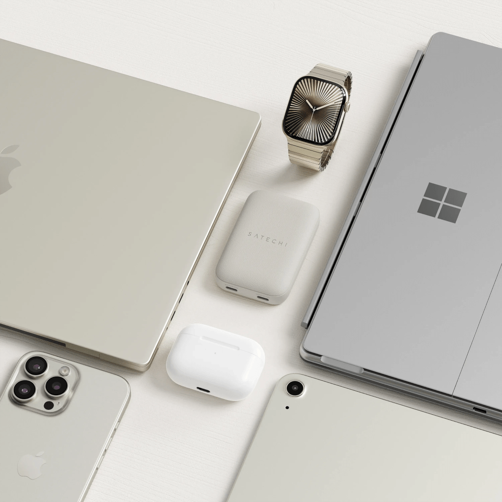 A group of laptops and a watch