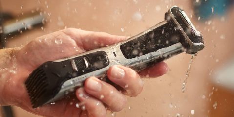 A person holding a razor