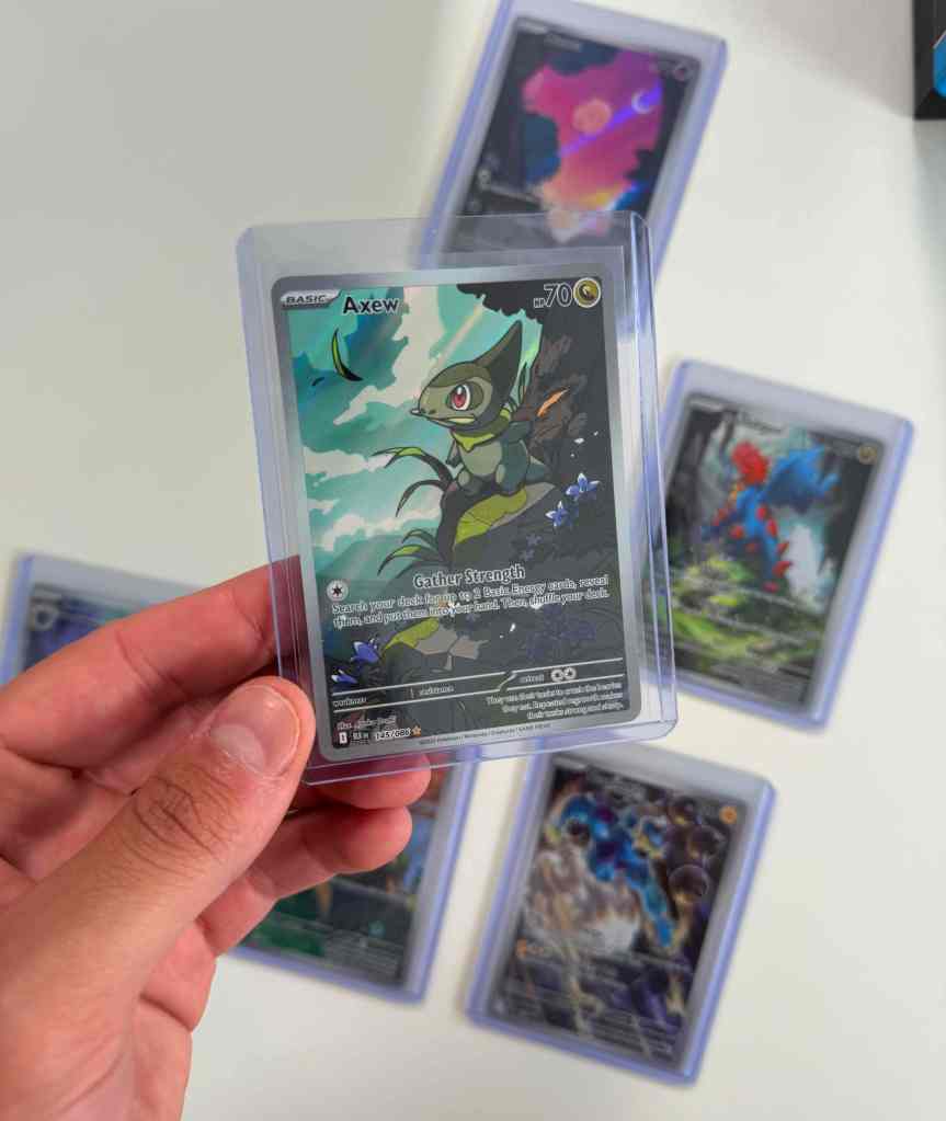 A hand holding a card