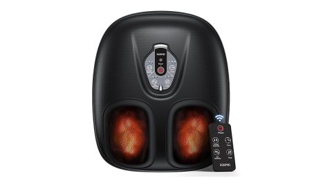 A black massage machine with two feet