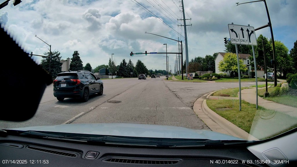 A car driving down a street
