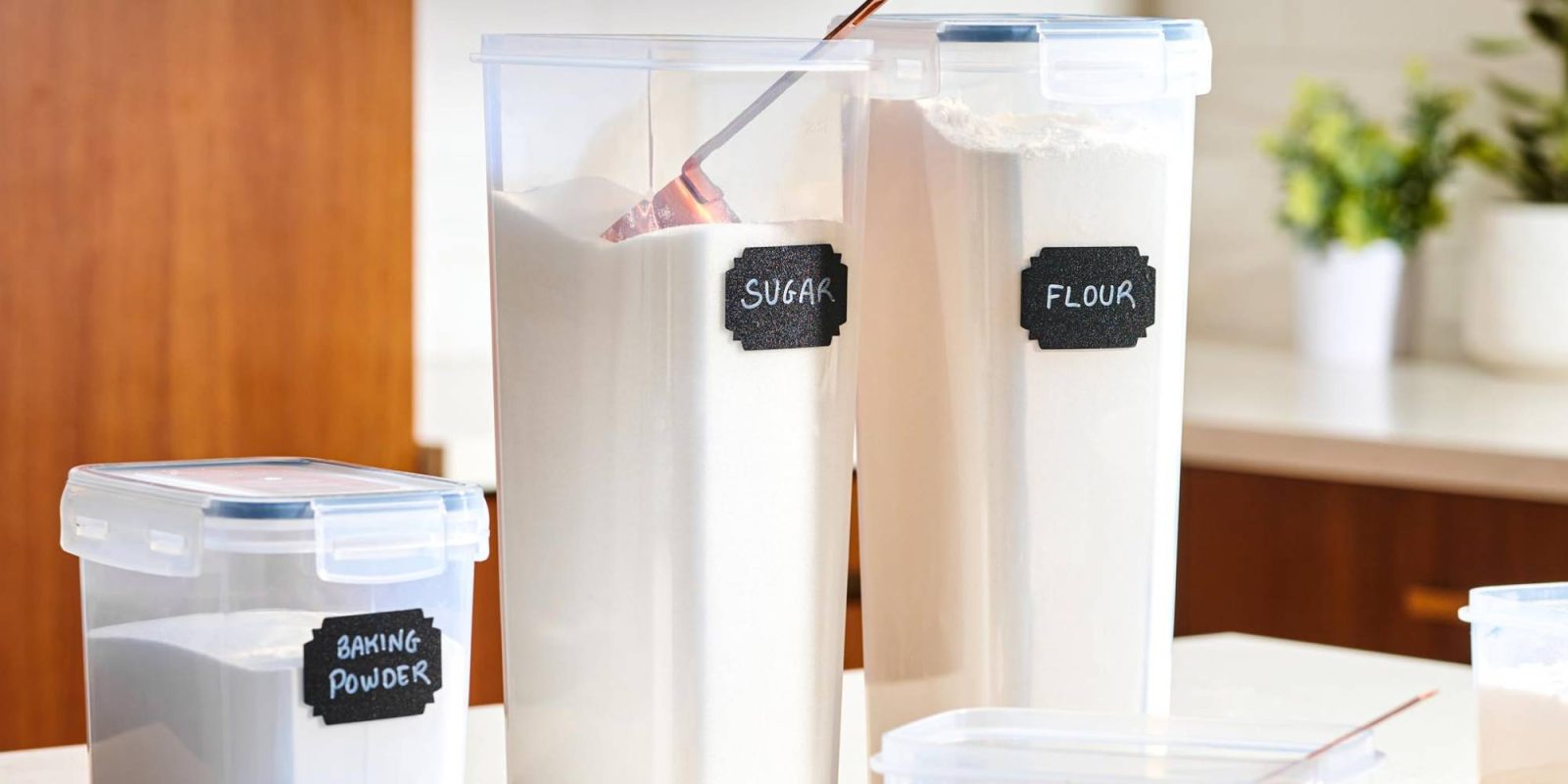 A group of containers with white powder