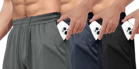 A man pulling a phone out of his pants