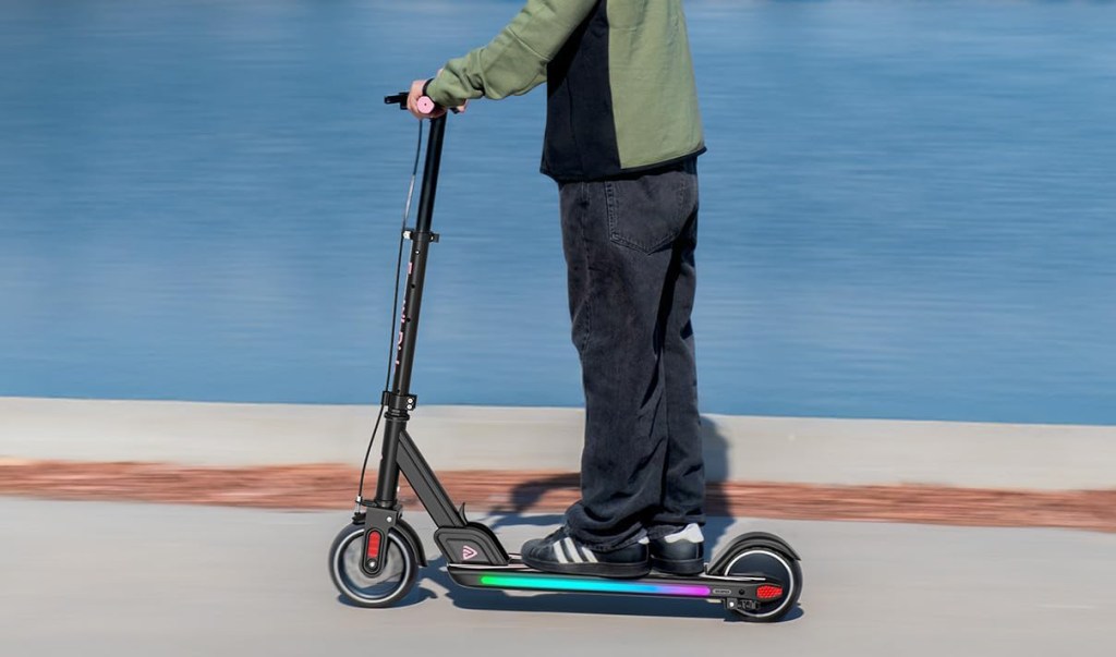 A person riding a scooter