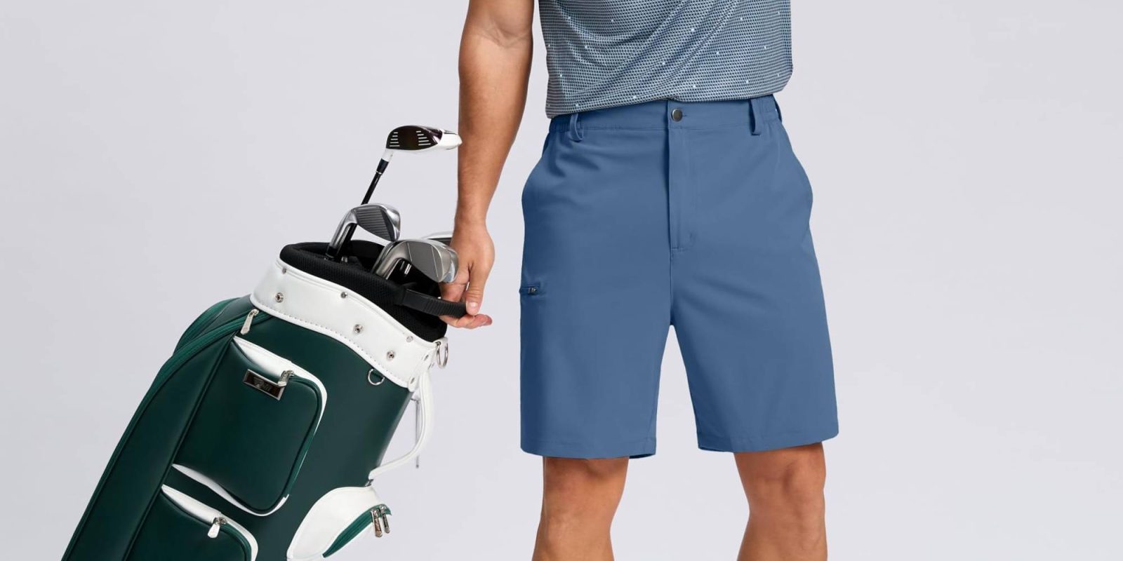 A man holding a golf bag