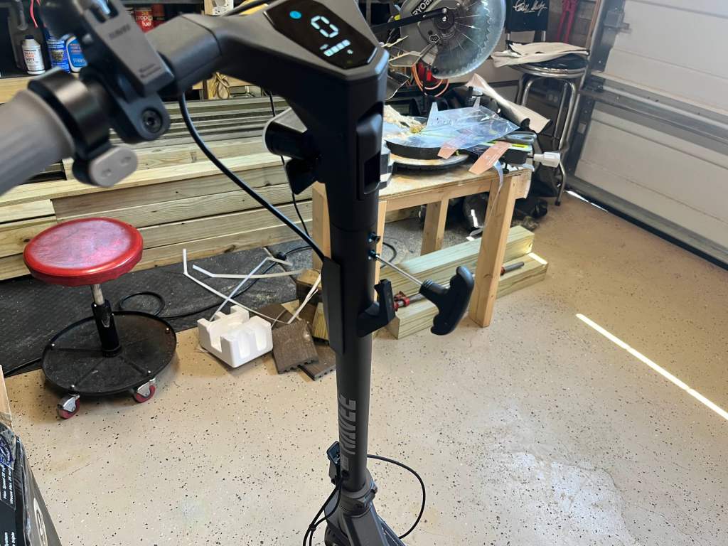 A black bike with a display