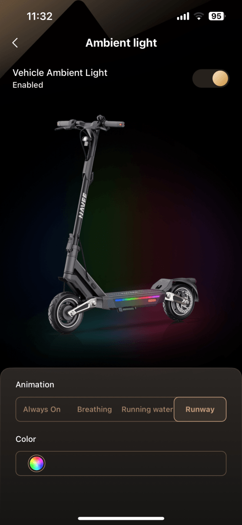 A black navee st3 pro scooter with a rainbow colored handle