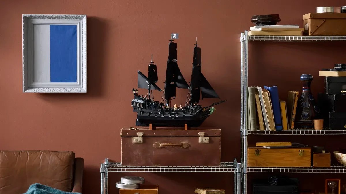 A model ship on a suitcase