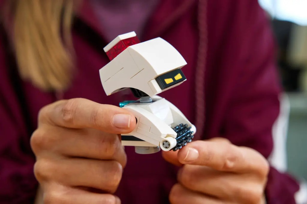 A person holding a toy