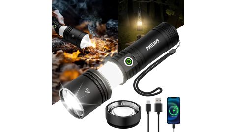 A flashlight with a cord and a phone