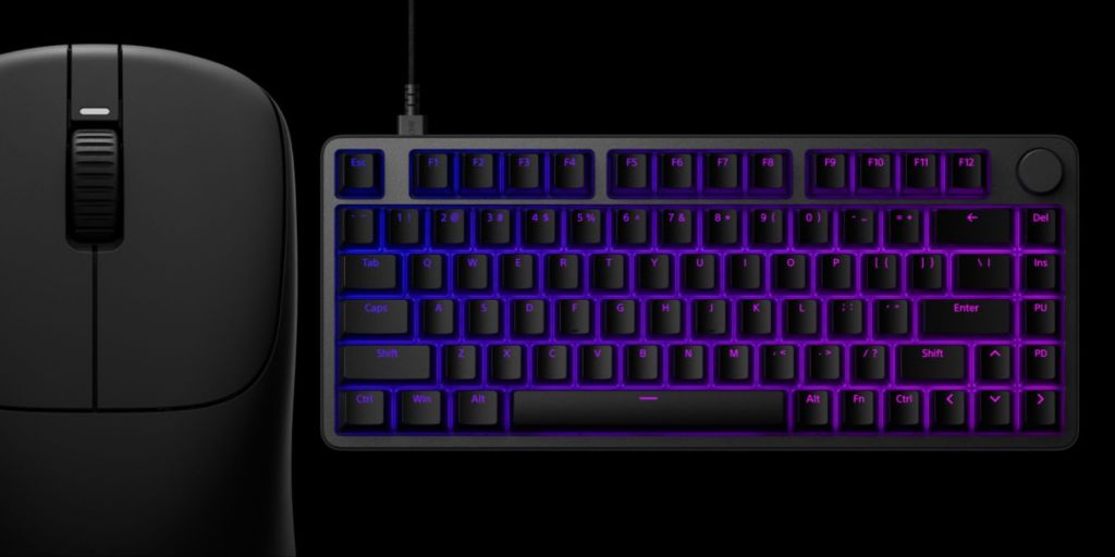 A keyboard and mouse with purple lights