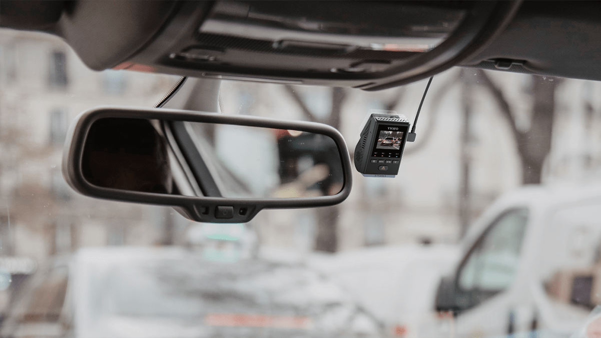 A rear view mirror of a car with a camera