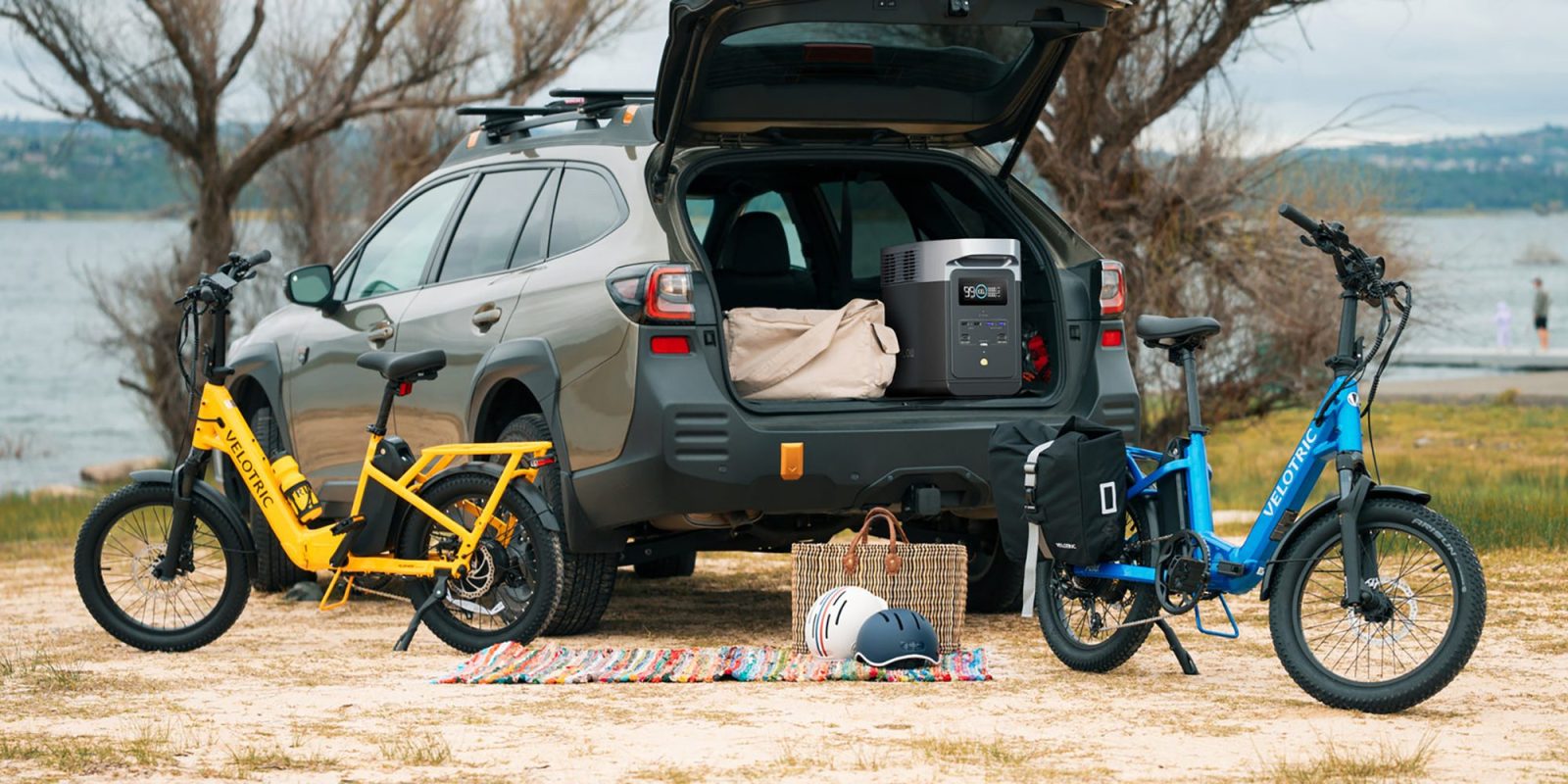 A car with a bag and a bicycle