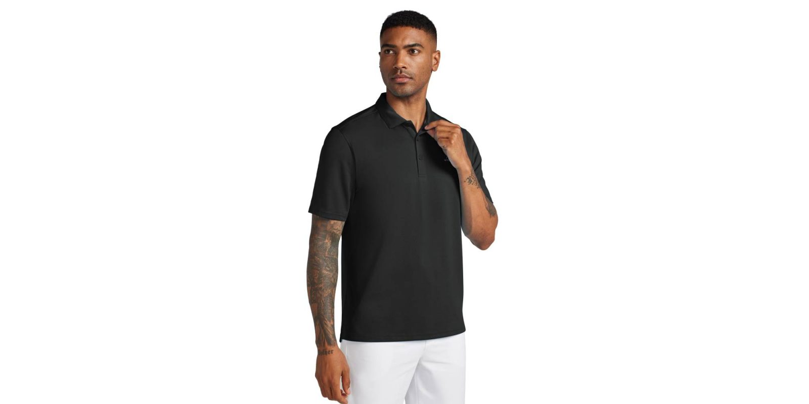 A man wearing a black polo shirt