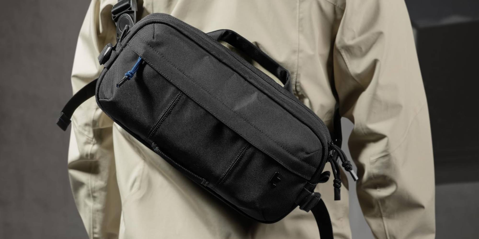 A person wearing a black bag