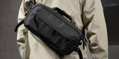 A person wearing a black bag