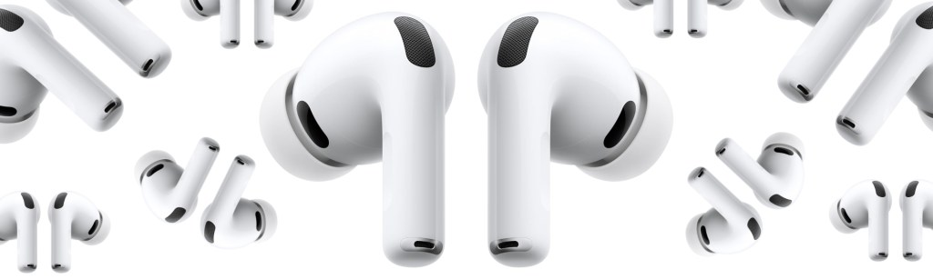 A pair of white wireless earbuds