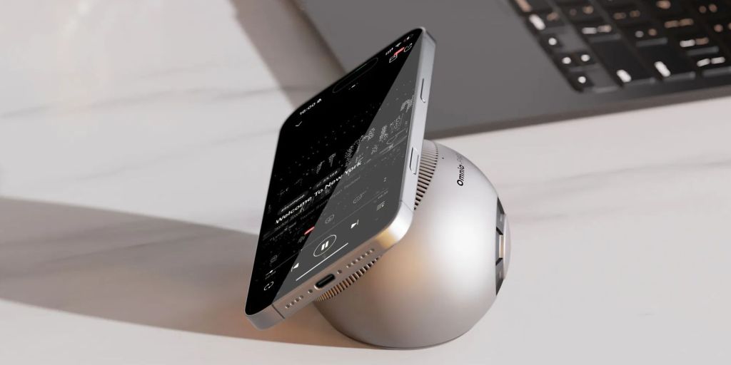 A phone on a wireless speaker
