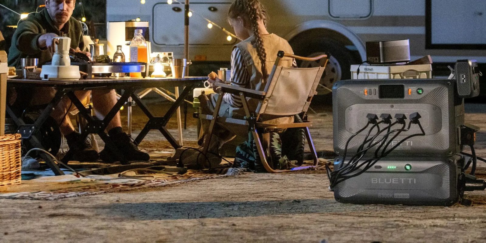 A girl sitting in a chair at a table
