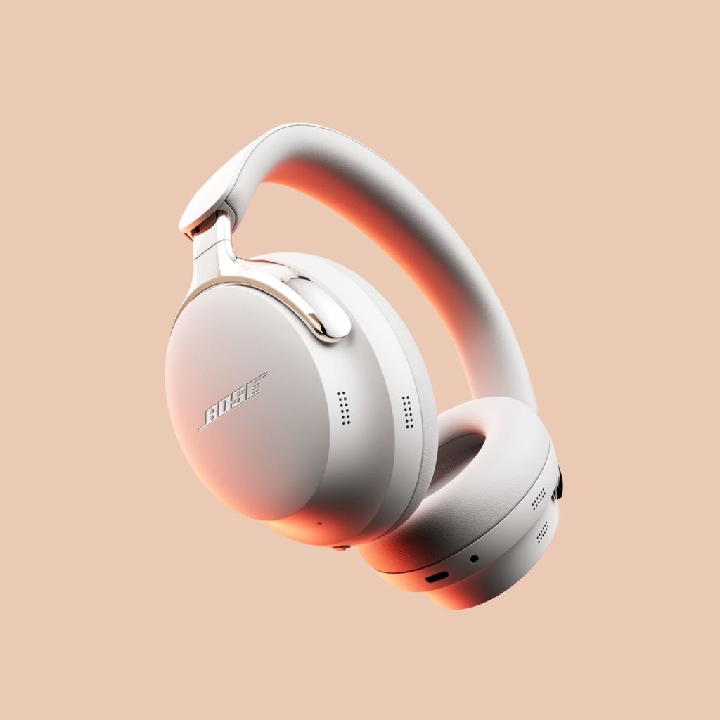 A white headphones with silver accents