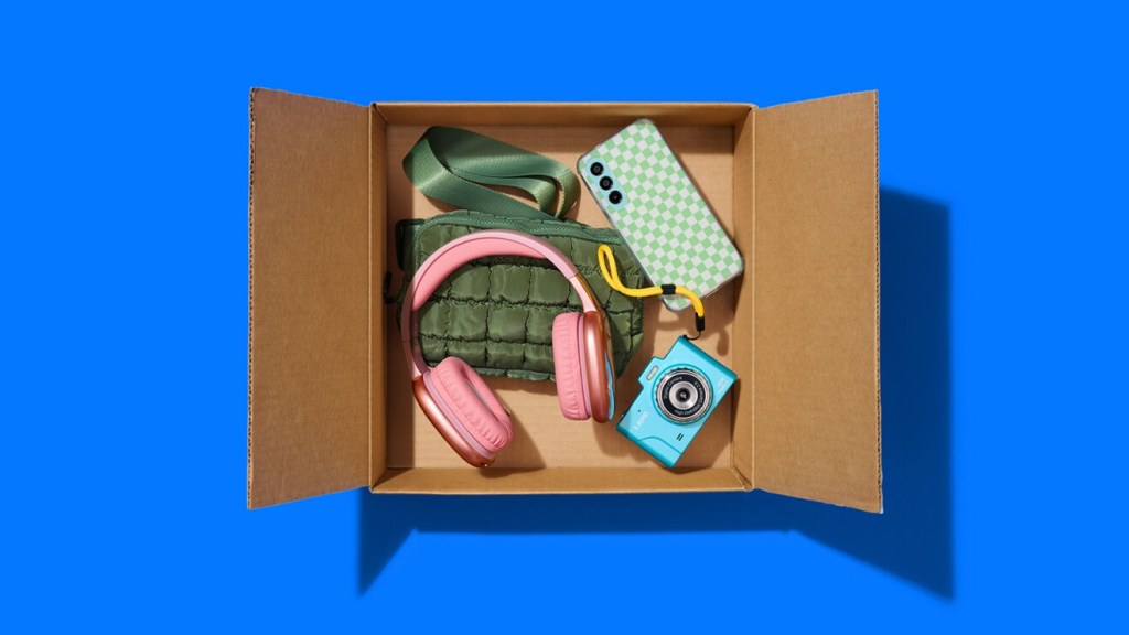 A box with a camera and headphones