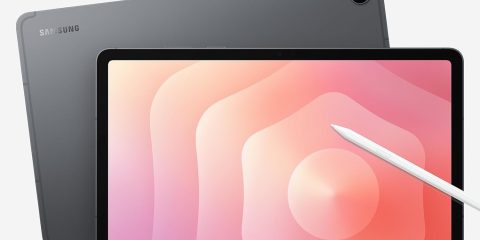 A tablet with a stylus and a pen