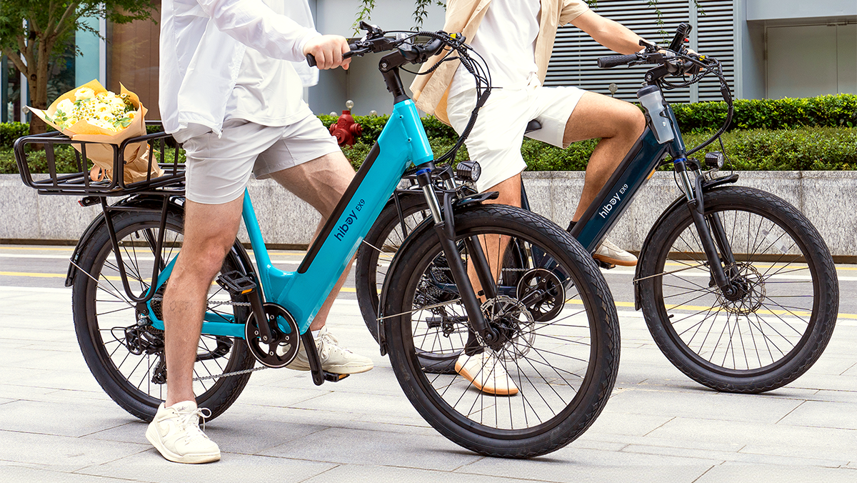 A group of people riding bicycles