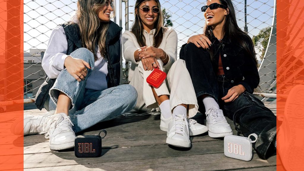 A group of women sitting on a porch