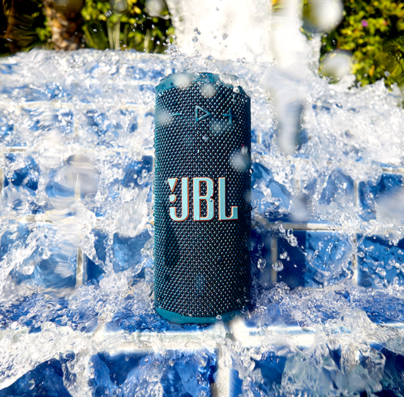 A blue speaker in water