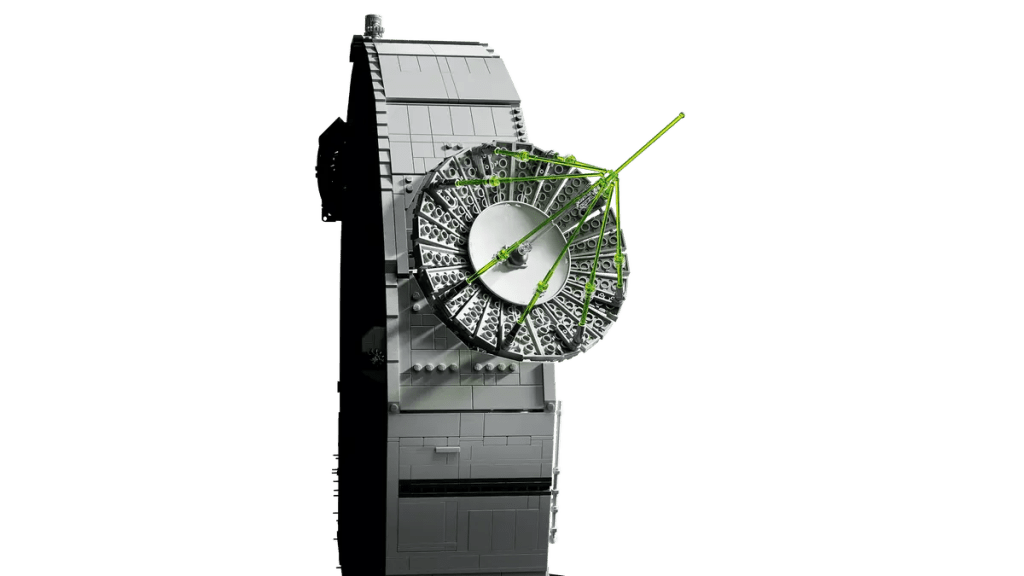 A large building block with a green string attached to it