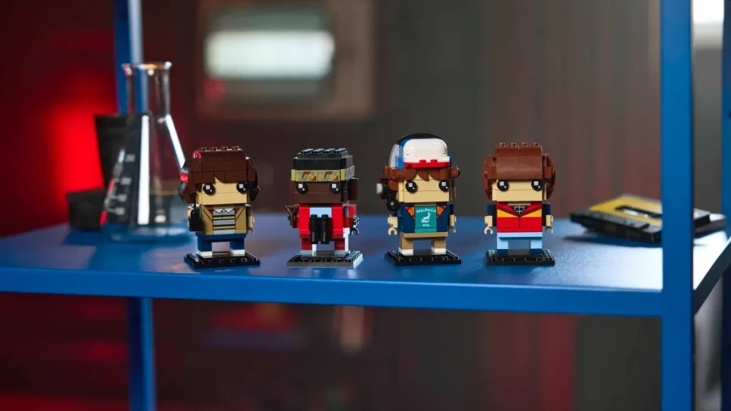 A group of lego figures on a shelf