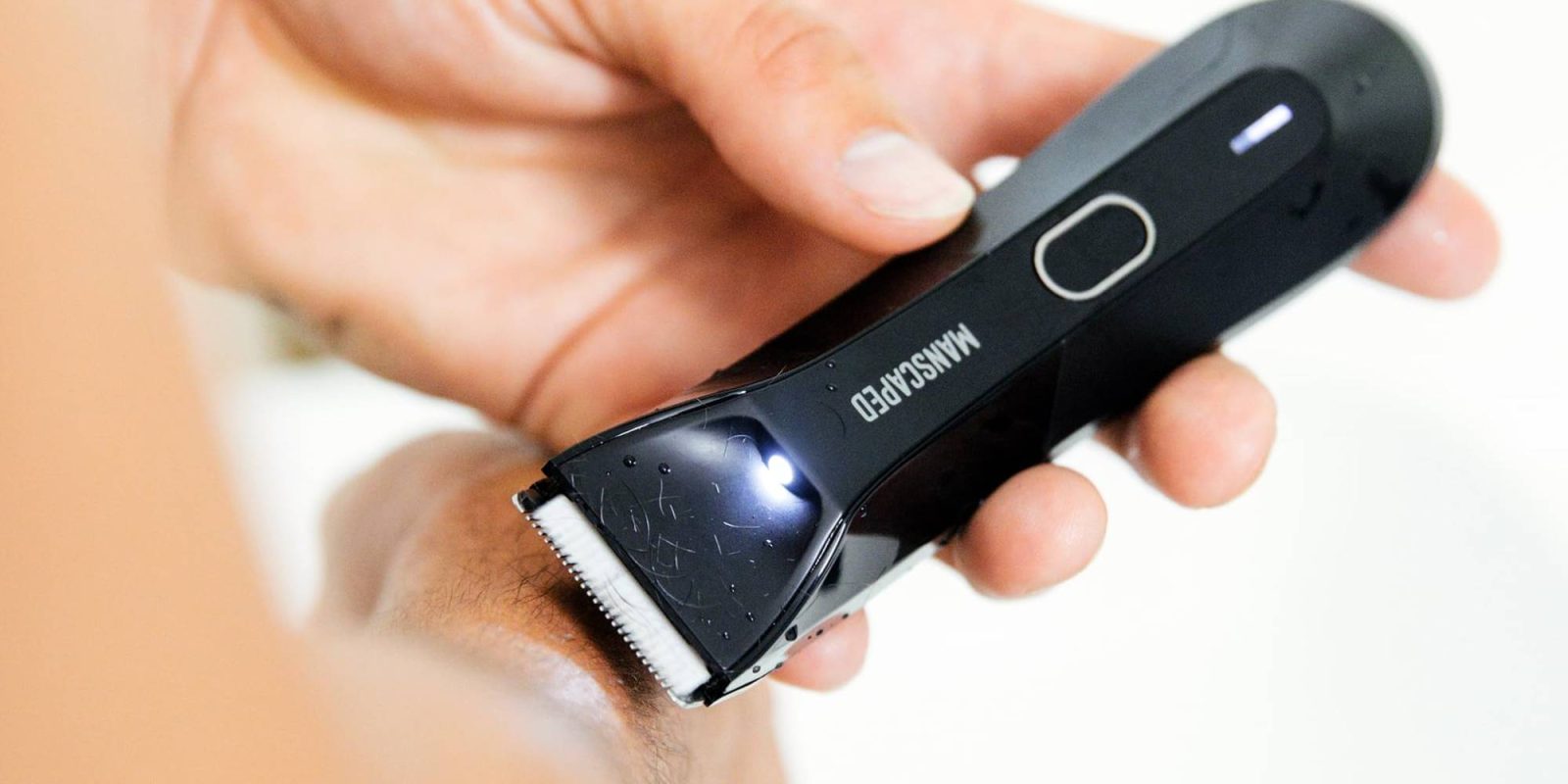 A person shaving his arm