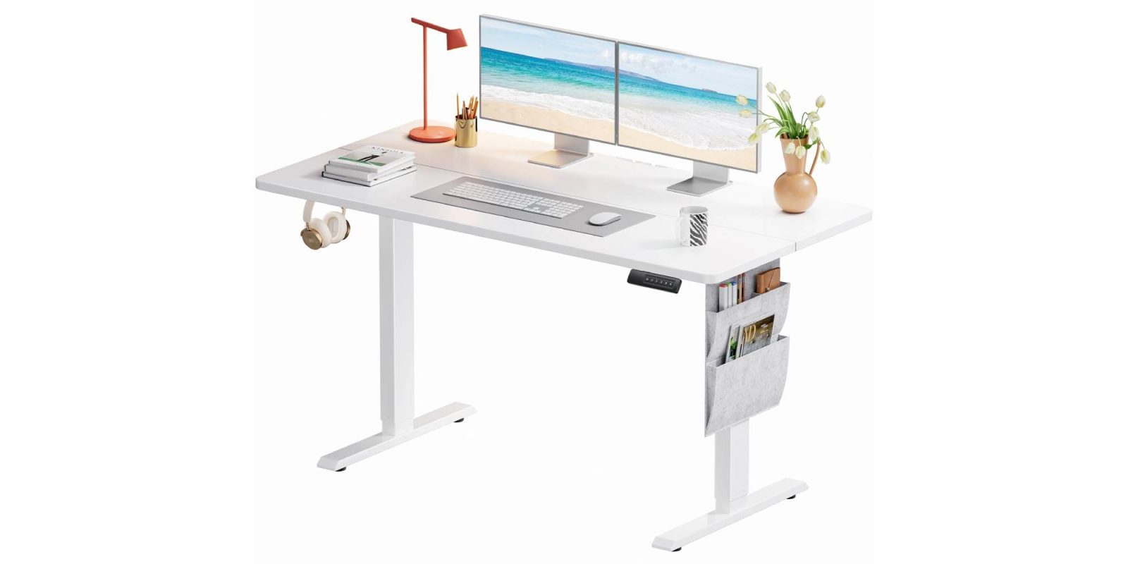 A white desk with a computer and a keyboard