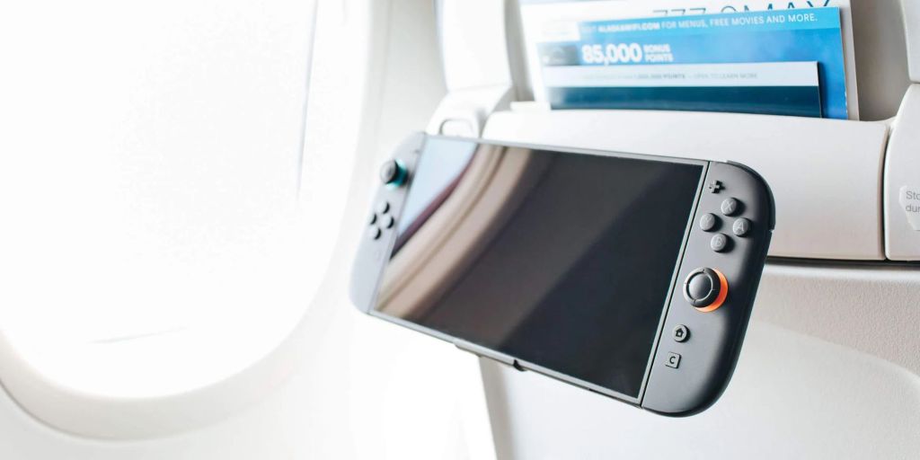 Image showing a Switch 2 mounted on a tray table.