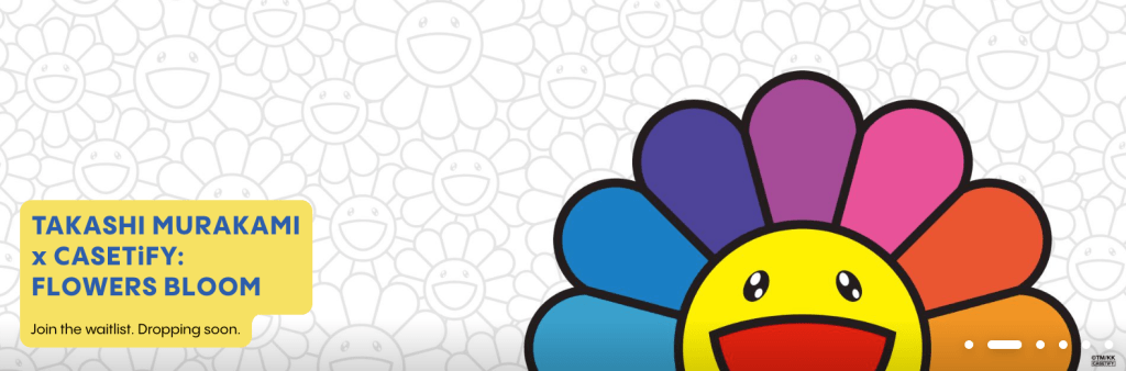 A blue yellow and purple flower with a face