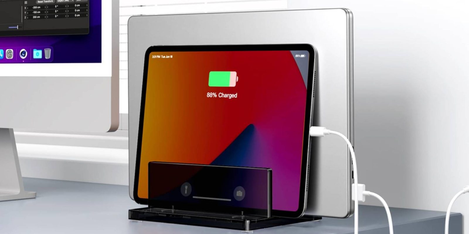 A tablet charging on a stand