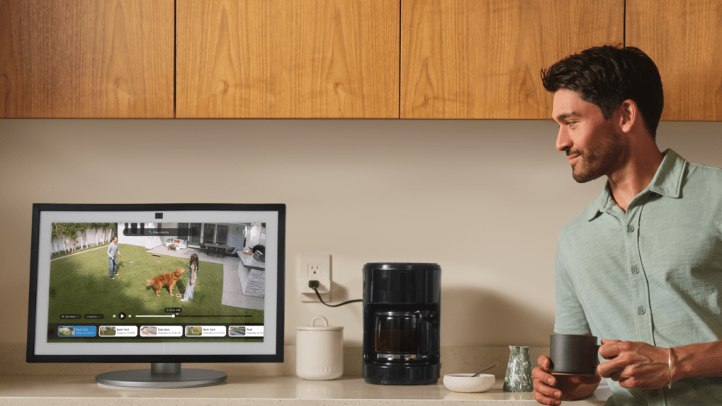 A man looking at a computer screen