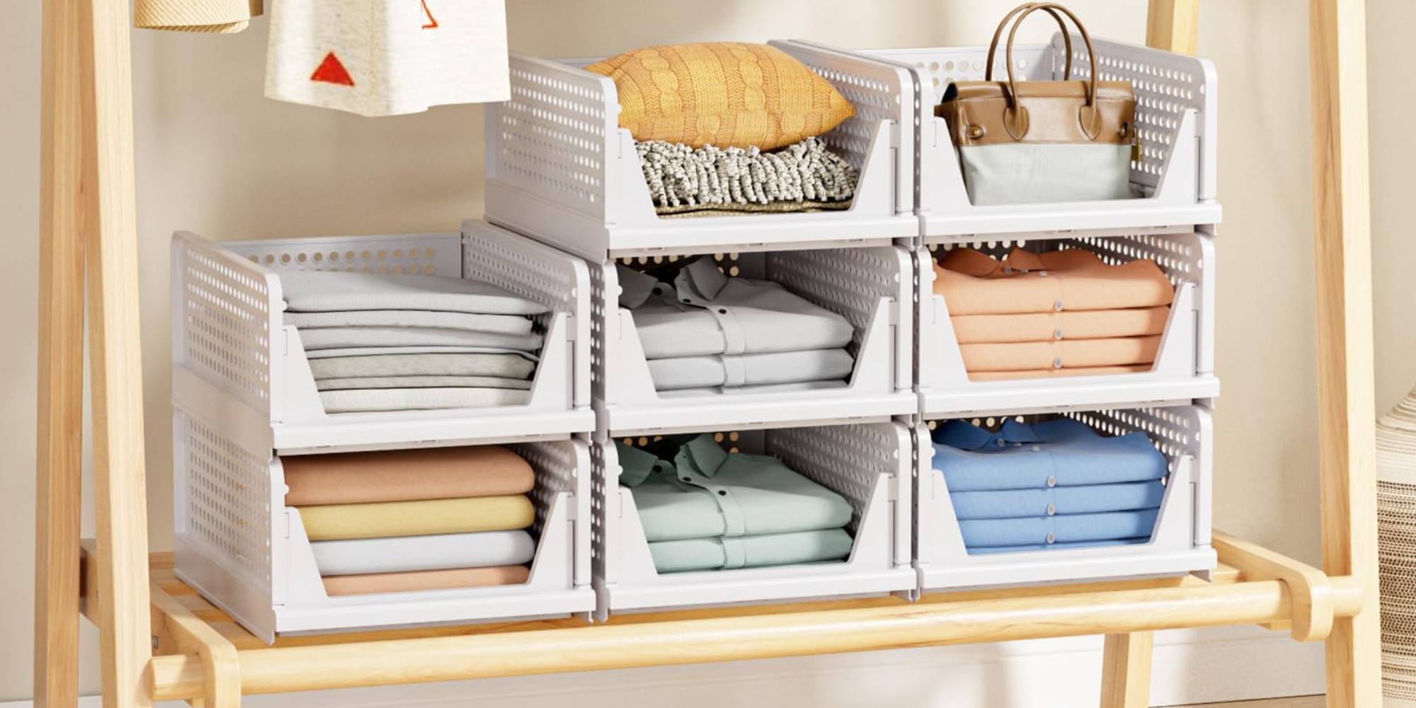 A stack of clothes and bags on shelves