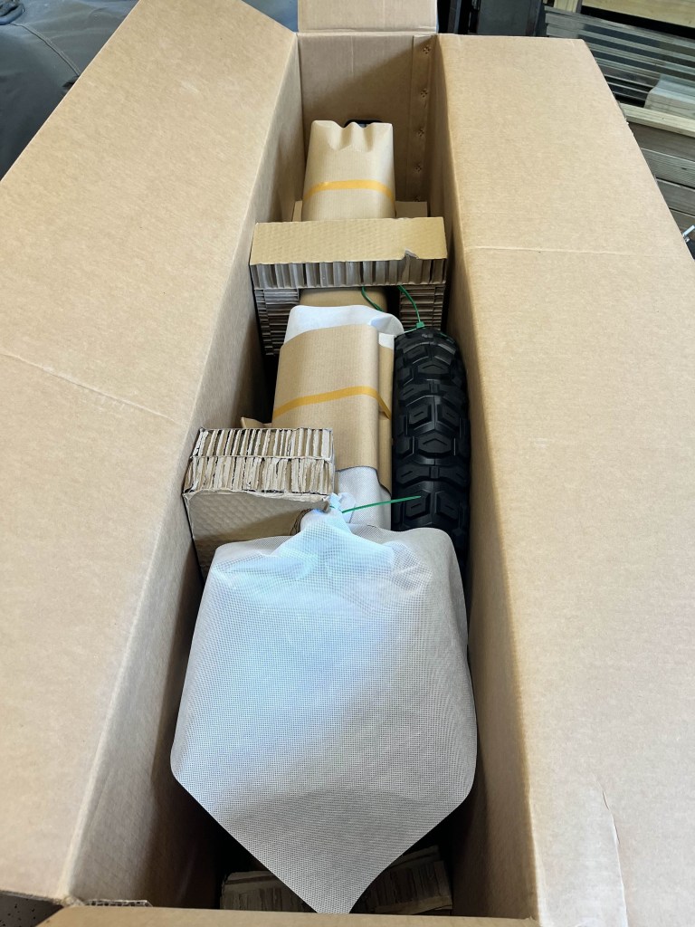 A cardboard box with various items inside