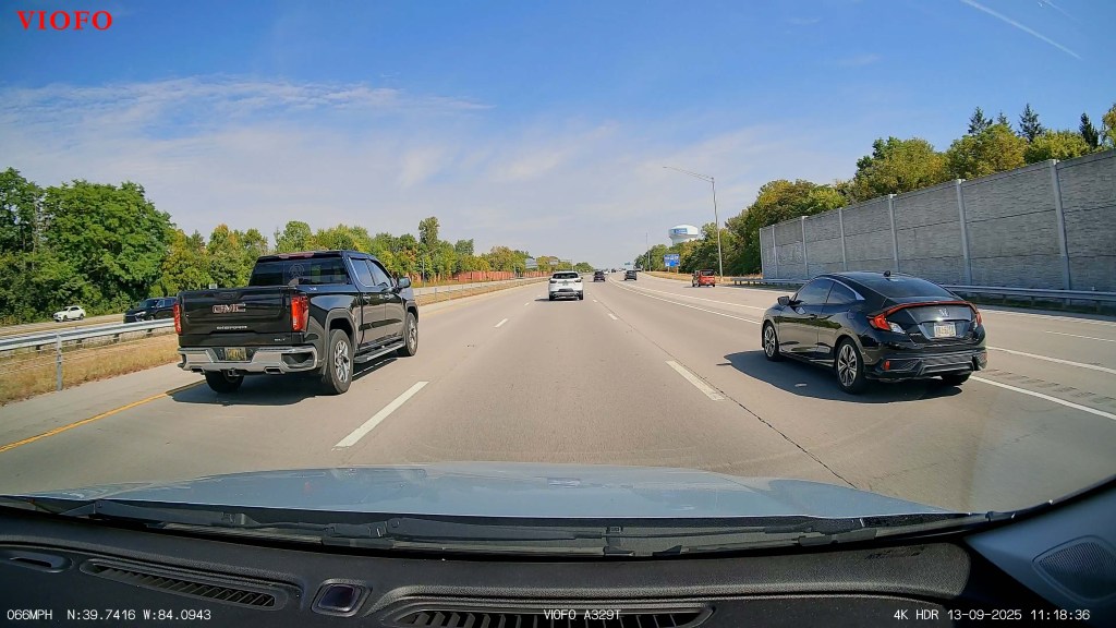 A car driving on a highway