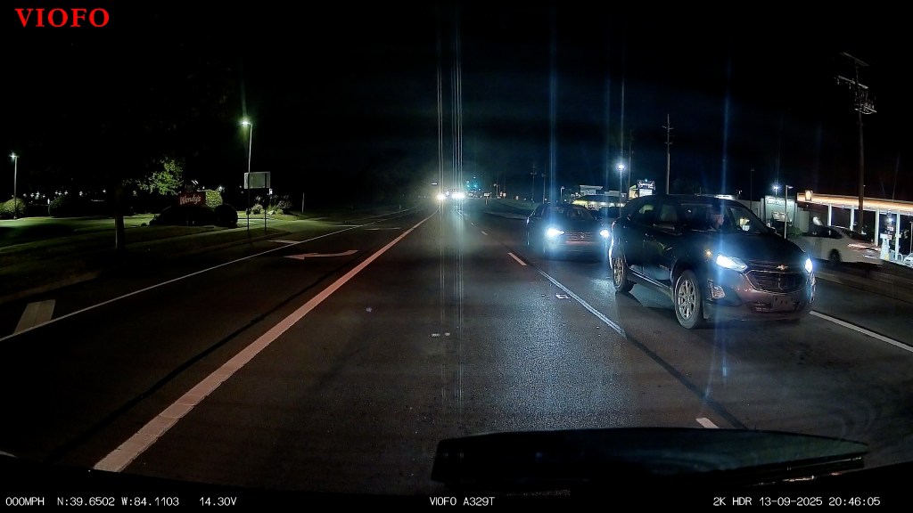 Cars on a road at night