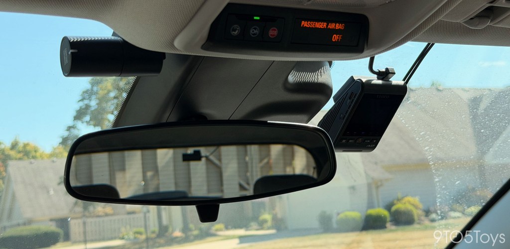 A rear view mirror and a car