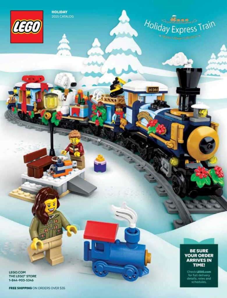 A toy train with a train and a woman standing next to it