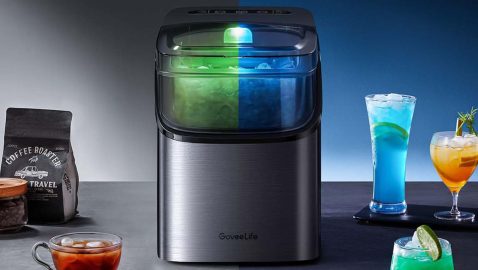 A machine with a blue and green light