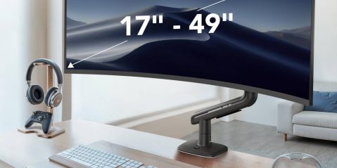 A computer monitor with a desert landscape