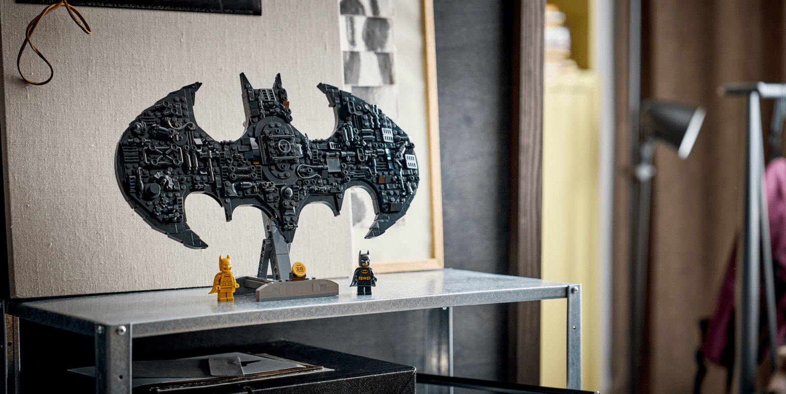 A lego batman figure on a table