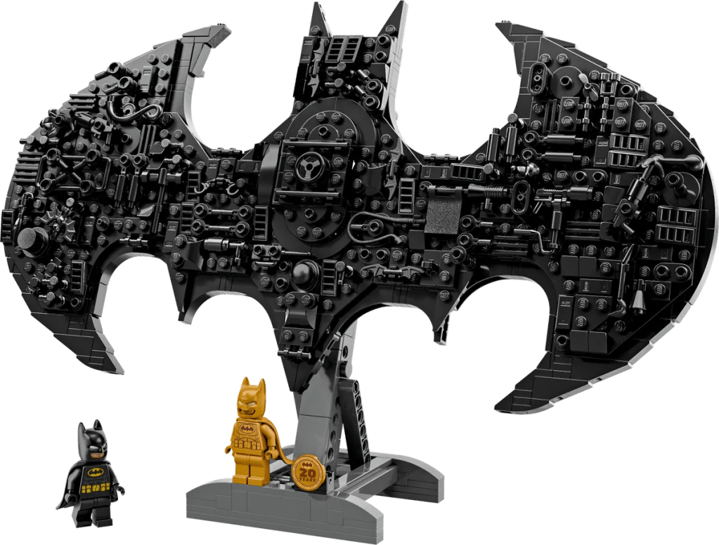 A lego batman bat with a yellow lego figure