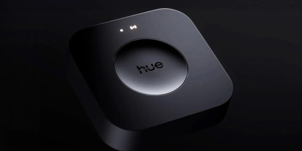 A black square device with a button